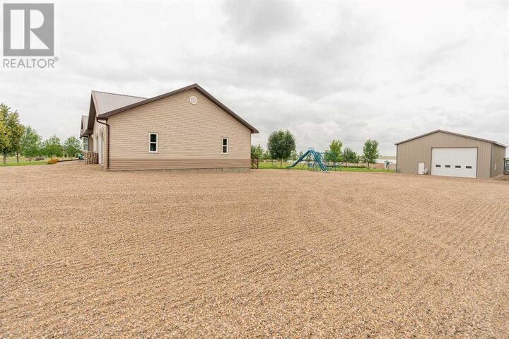 Property Photo:  123047 Township Road 102  AB T0K 0J0 