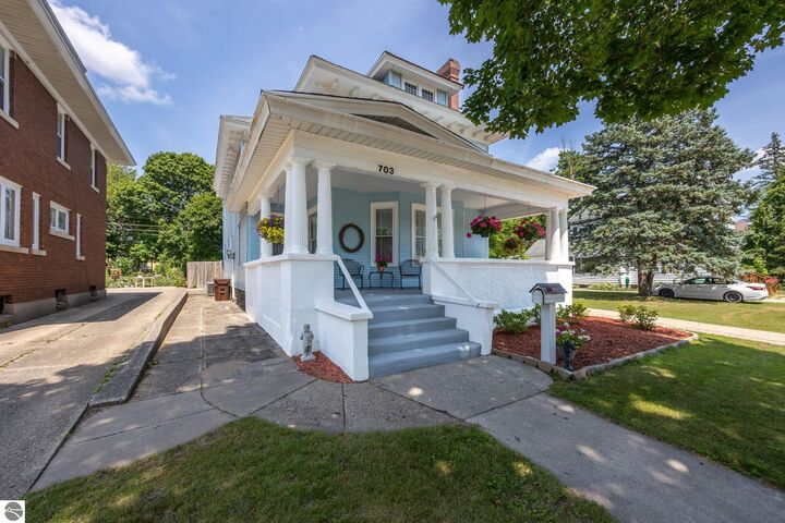 Property Photo:  703 E Division Street  MI 49601 