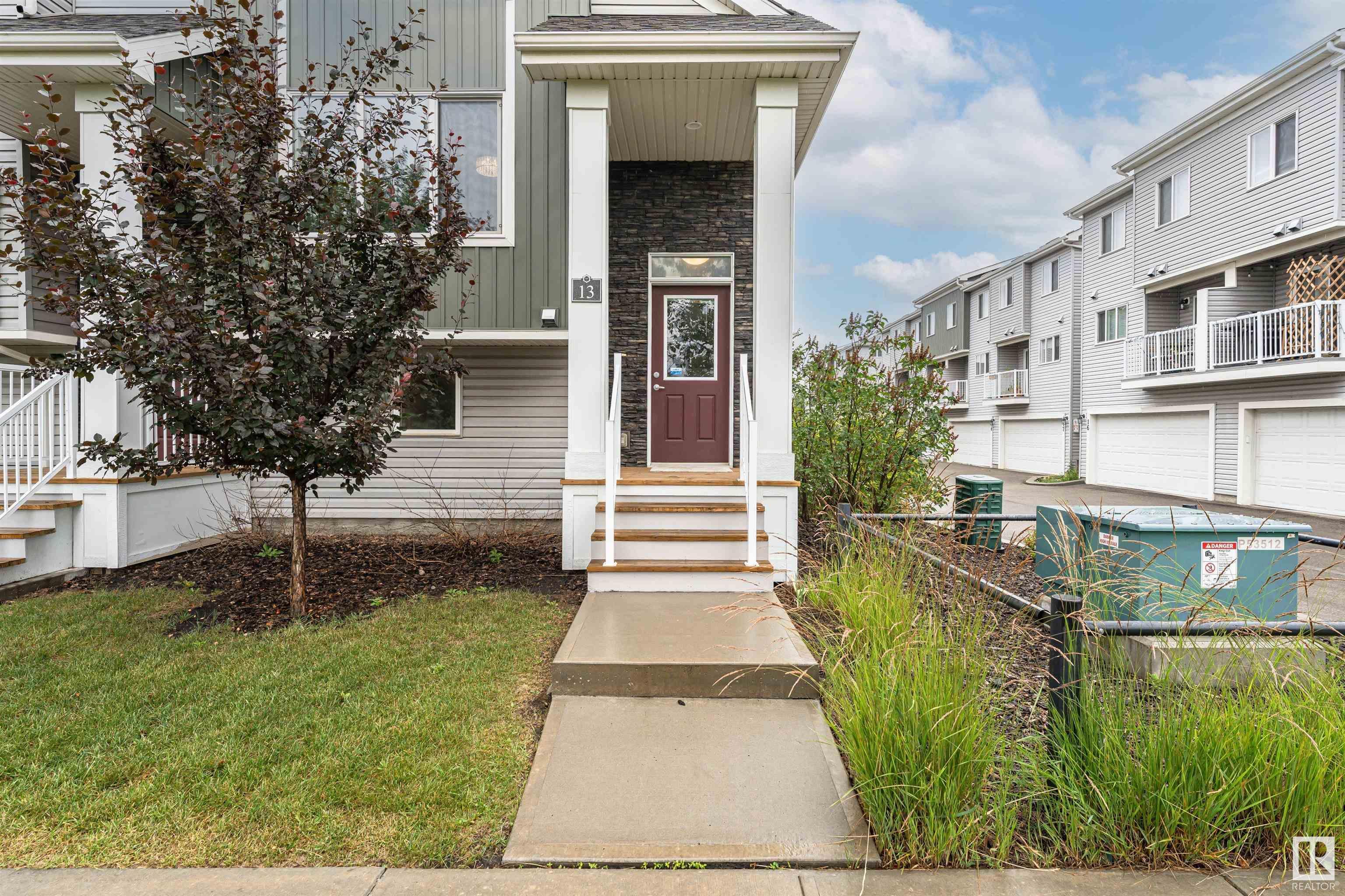 Property Photo: 2121 Haddow Drive NW 13 AB T6R 0W6