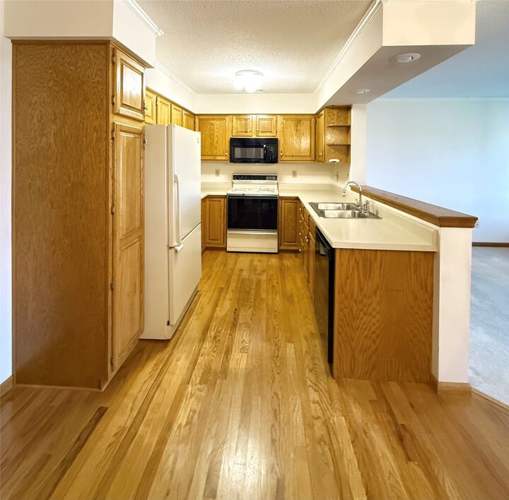 Property Photo: 405 SE Delaware Avenue 207 IA 50021