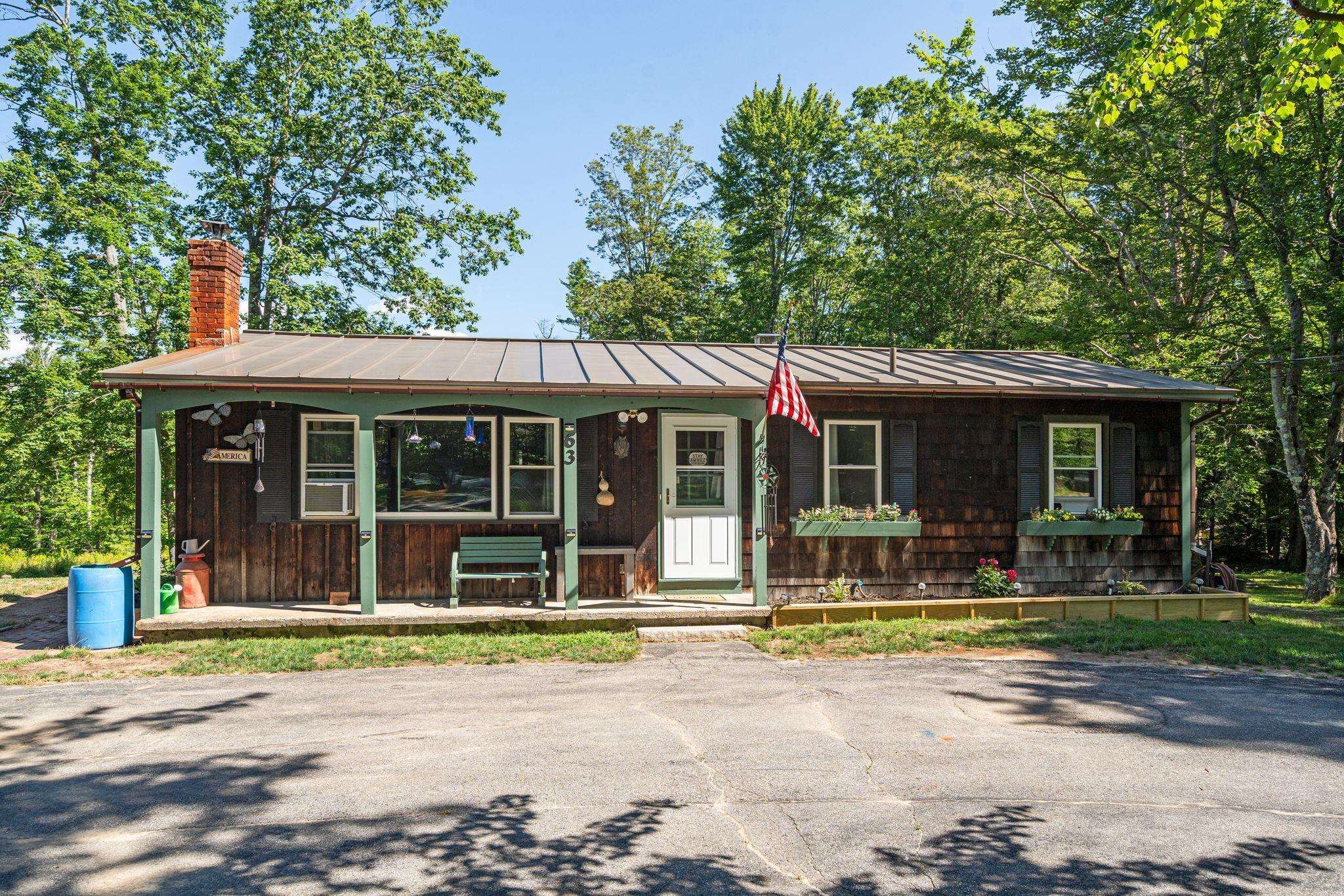 Property Photo: 63 Zephyr Lake Road NH 03047