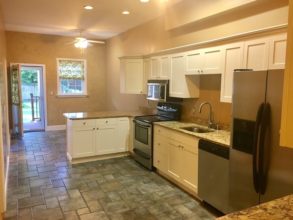 Property Photo: 617 E 3rd St 1 MA 02127
