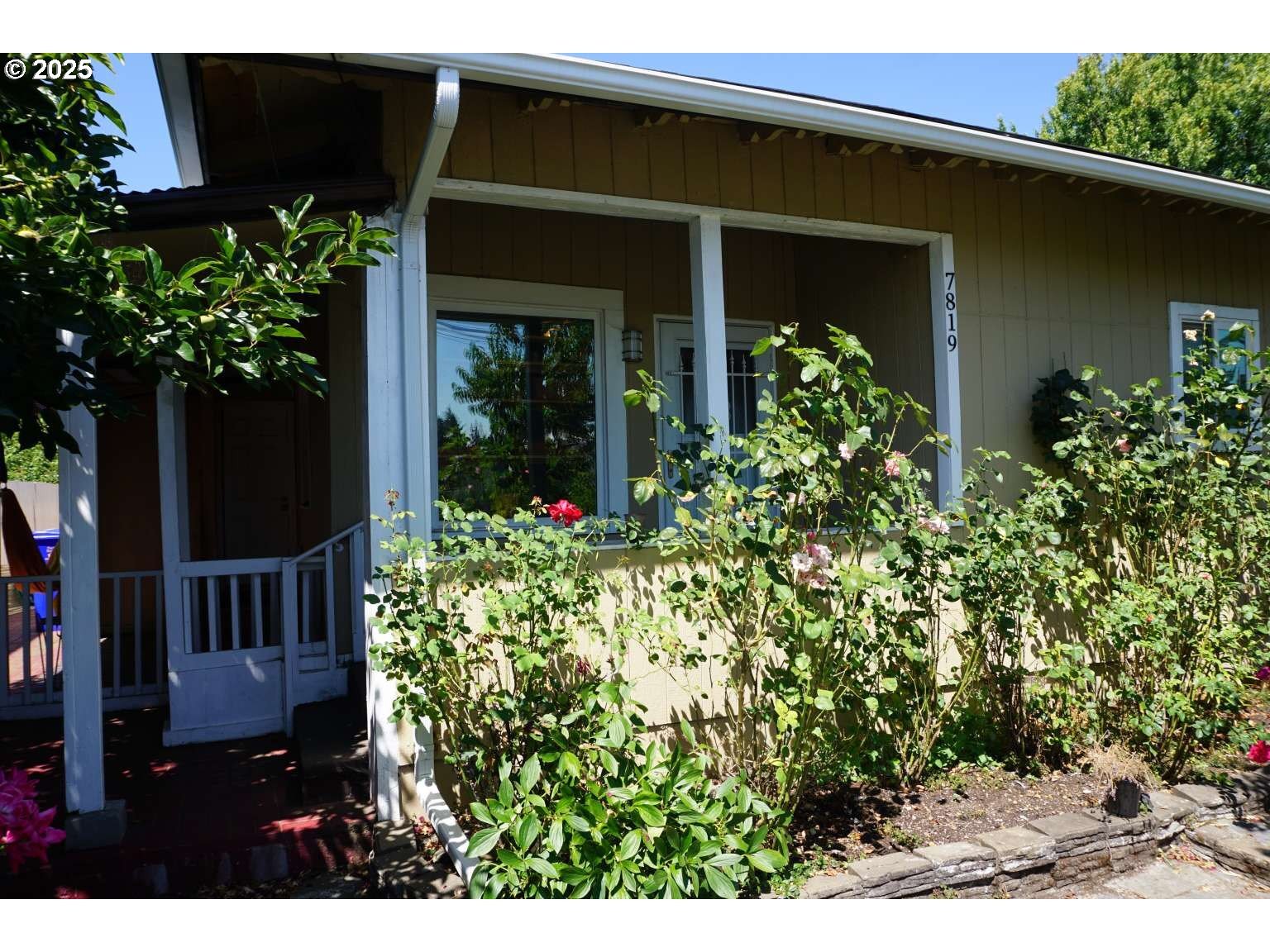 Property Photo:  7819 SE Duke St  OR 97206 