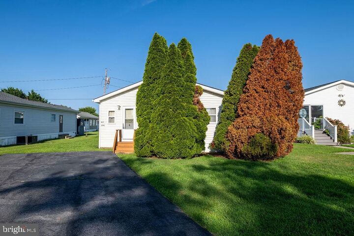 Property Photo:  21791 C St 4065  DE 19971 