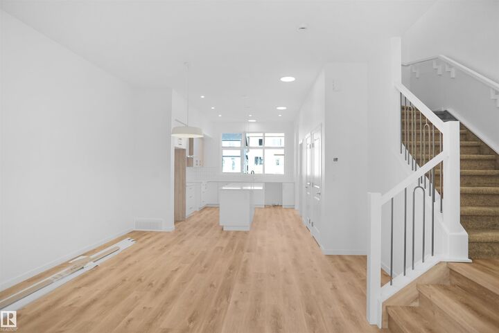 Property Photo:  5115 Parc Reunis Way  AB T4X 3E6 