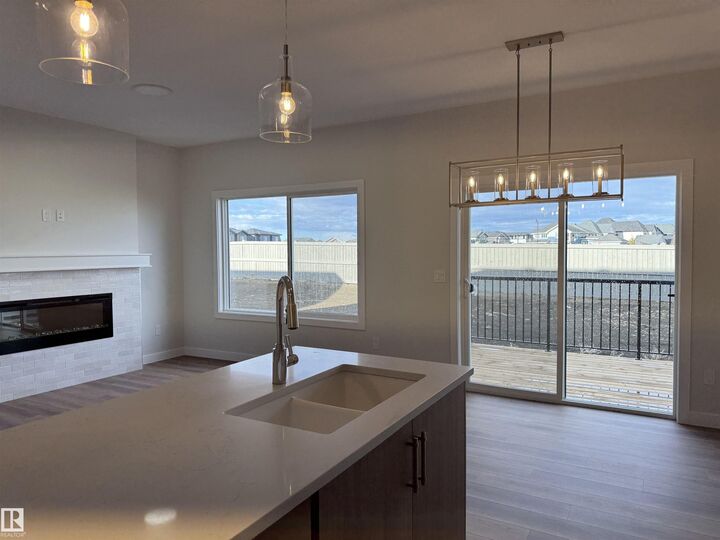 Property Photo: 3312 Roy Brown Way NW AB T5E 6Z9