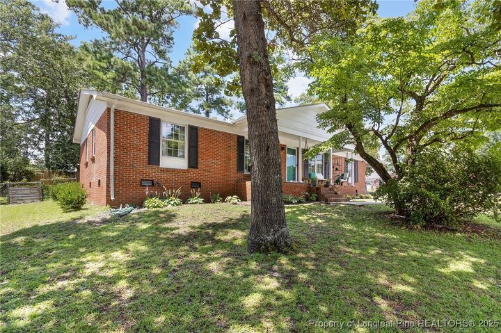 Property Photo:  411 Lotus Drive  NC 28303 