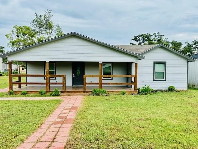 Property Photo:  229 E Washington Street  TX 77422 