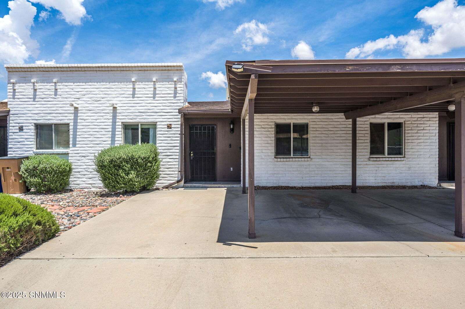 Property Photo:  1605 S Telshor Boulevard Unit N  NM 88011 