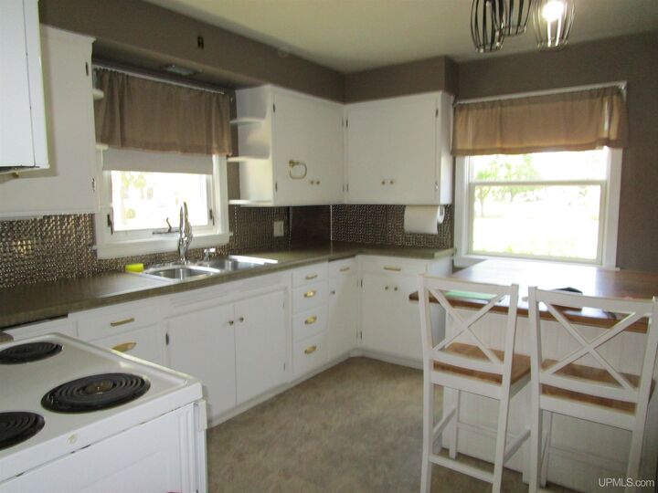 Property Photo: 1102 S 10th Avenue MI 49829