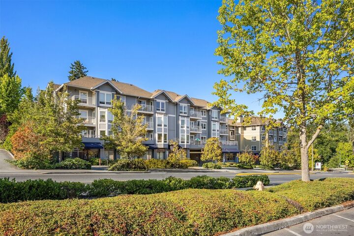 Property Photo:  300  High School Road NE 419  WA 98110