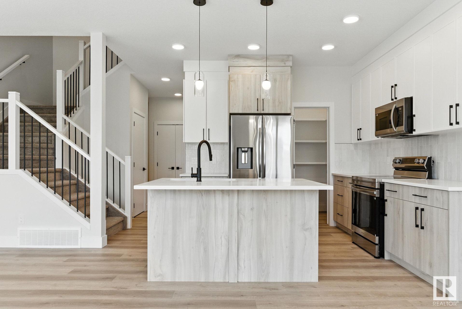 Property Photo:  8831 181 Avenue NW  AB T5Z 0X4 