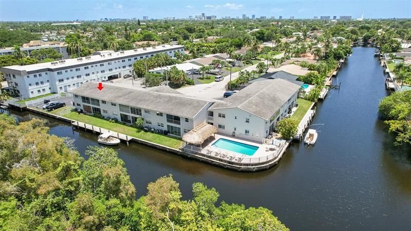 Property Photo:  1400 NE 55 St 208  FL 33334 