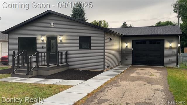 Property Photo:  42 Hartley Street  MI 48446 