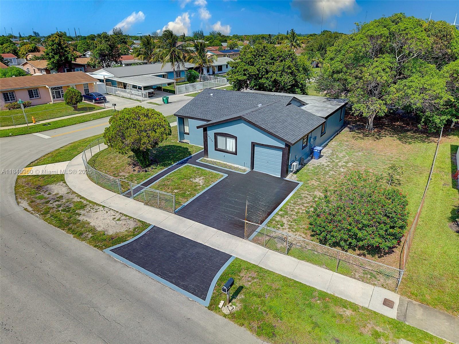 Property Photo:  20239 NW 33rd Ct  FL 33056 