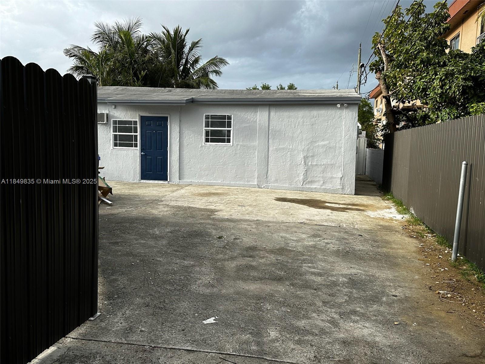 Property Photo: 2223 NW 32nd St FL 33142