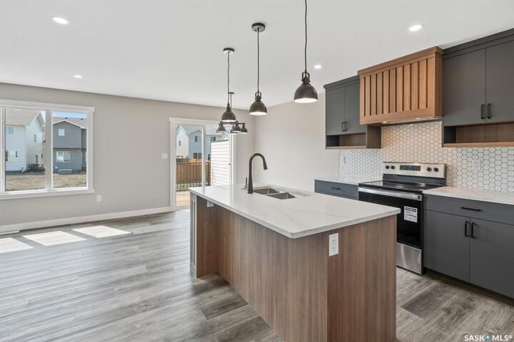 Property Photo: 328 Myles Heidt Lane SK S7W 1J3