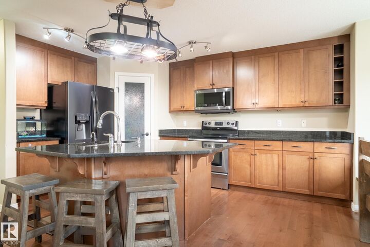 Property Photo:  7280 Essex Way  AB T8H 0L2 