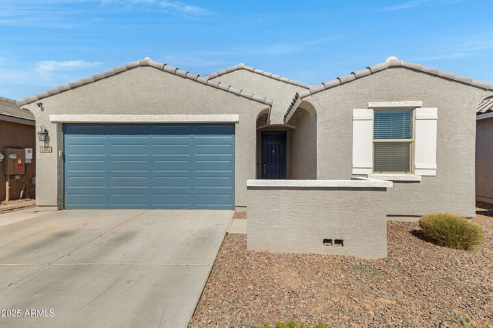 Property Photo:  5642 W Rainwater Drive  AZ 85339 