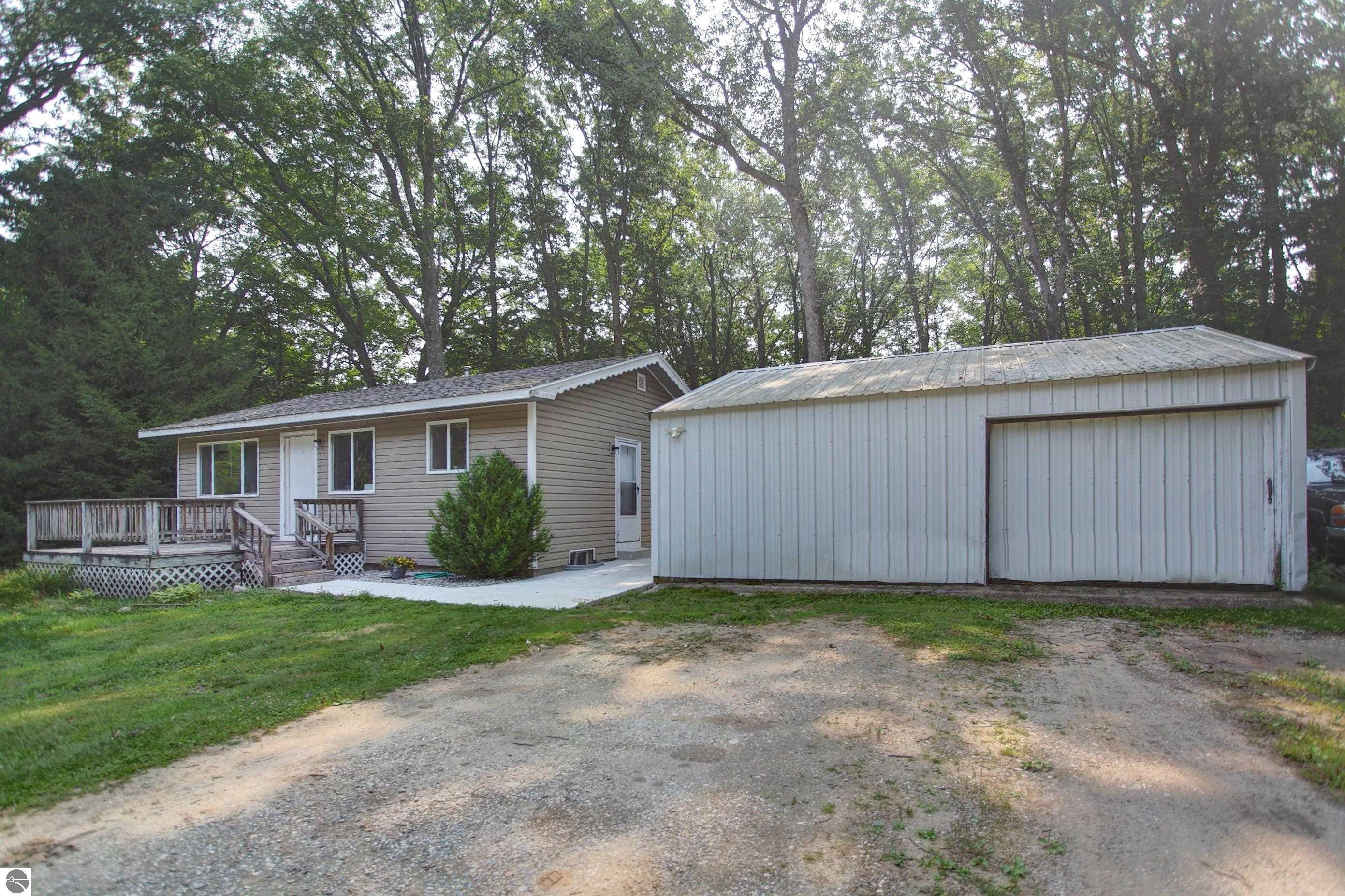 Property Photo:  7143 Karlin Road  MI 49643 