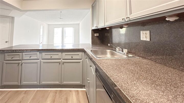 Property Photo:  8040 N Colony Cir N 201  FL 33321 