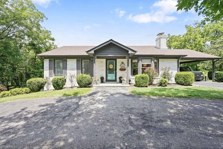 Property Photo:  7123 Strawberry Road  NC 27358 