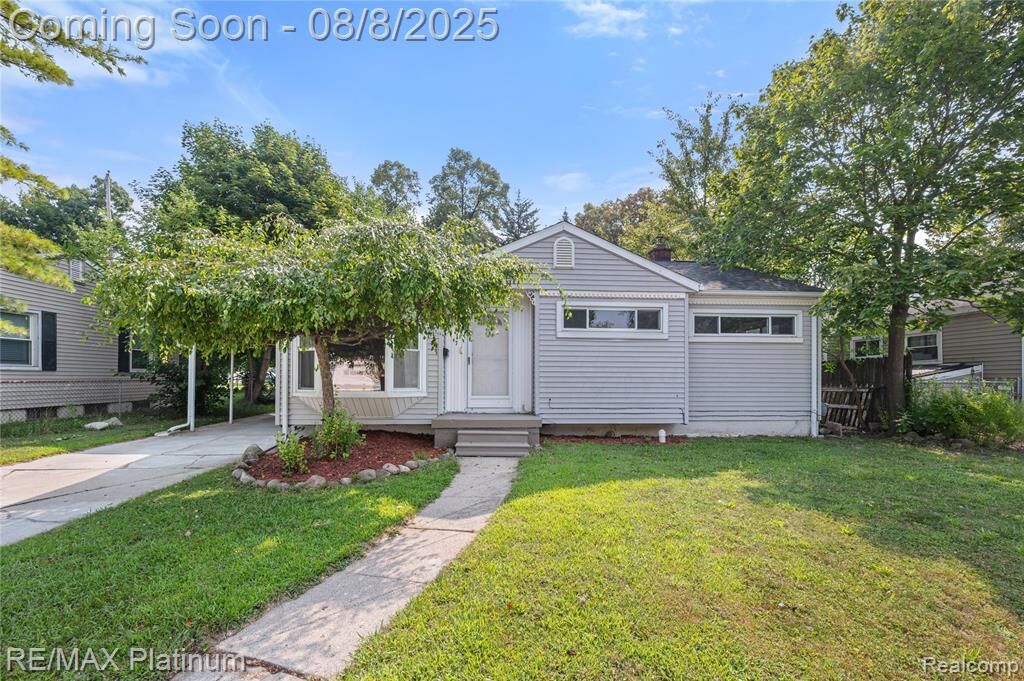 Property Photo: 708 Elmwood Drive MI 48430 1407