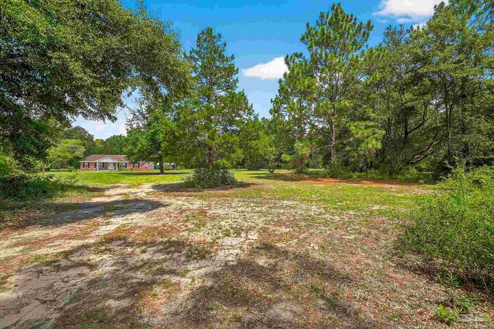 Property Photo:  5844 Parsons Rd  FL 32570 