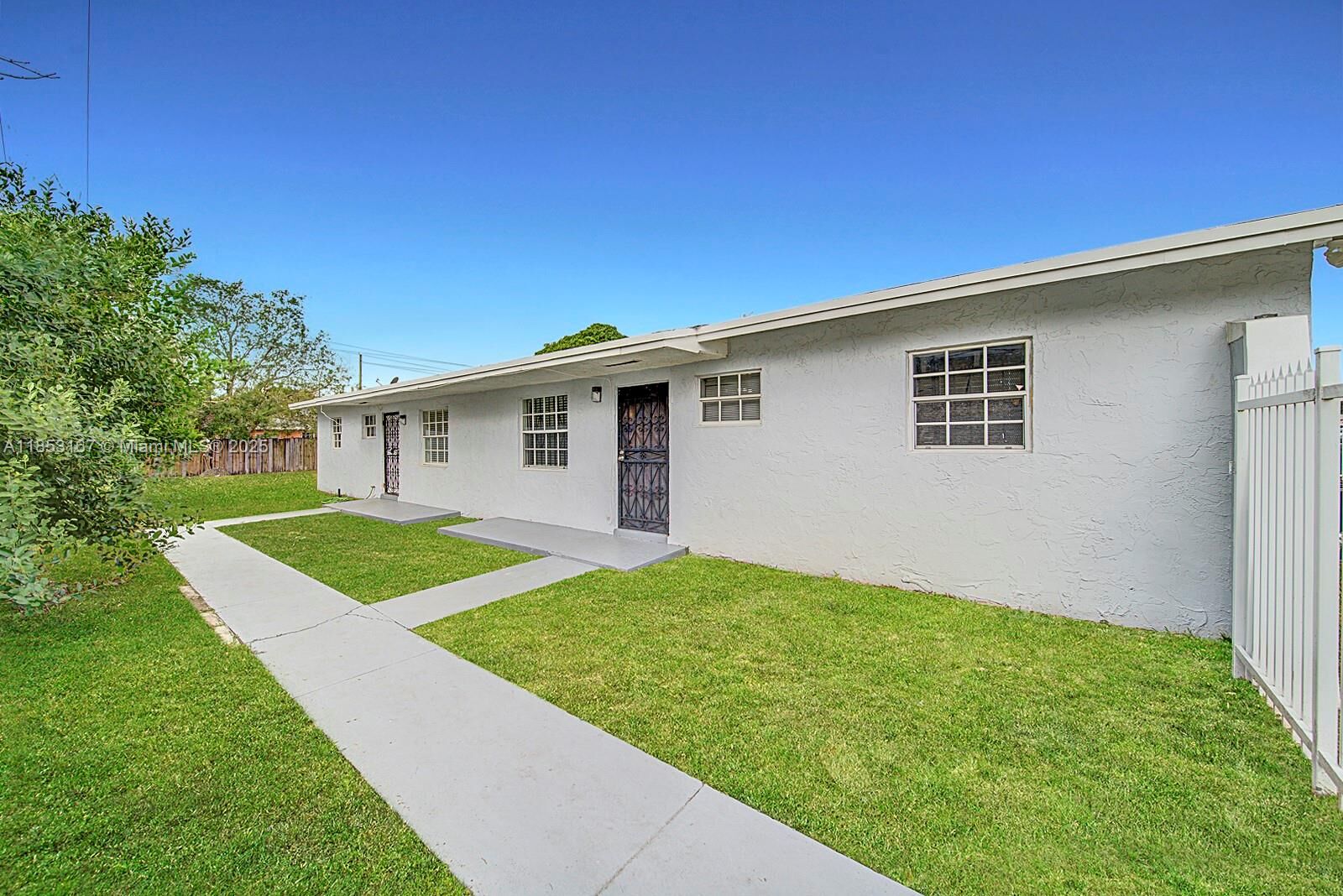 Property Photo: 19110 NW 36th Ave 19110 FL 33056