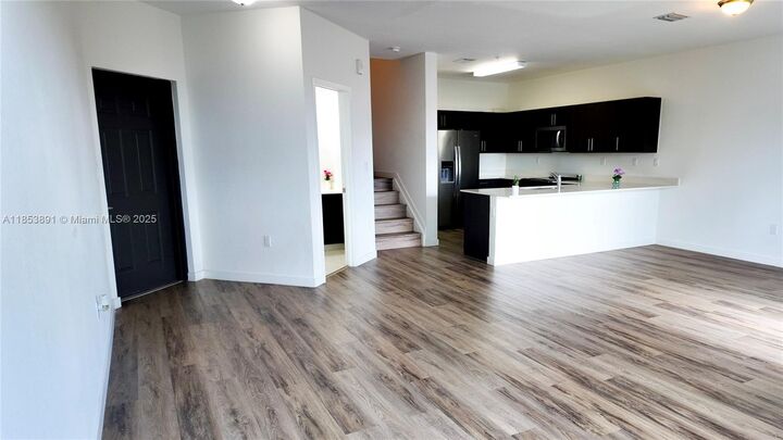 Property Photo:  15560 SW 136 St #3-206  FL 33196 