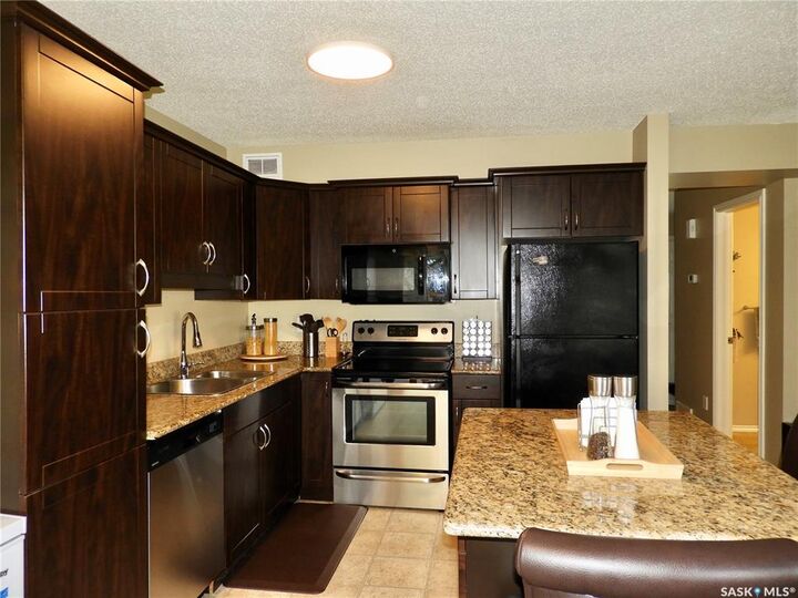 Property Photo: 105 Lynd Crescent 211 SK S7T 0C3