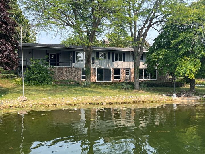Property Photo:  4854 Apache Path  MI 48867 