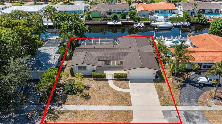 Property Photo: 1430 NE 57th Ct FL 33334