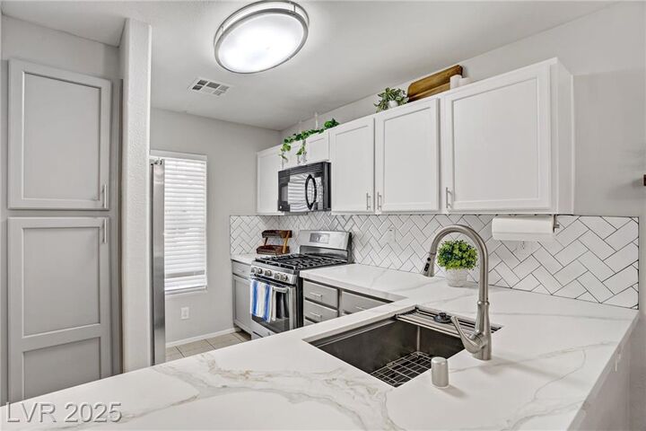 Property Photo:  7335 Escarpment Street  NV 89139 
