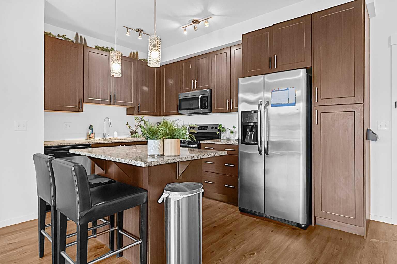 Property Photo: 755 Copperpond Boulevard SE 4412 AB T2Z 4R2