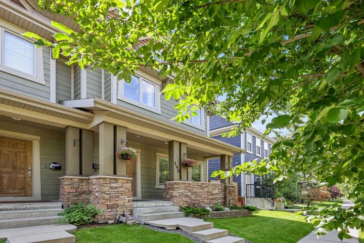 Property Photo:  140 Mike Ralph Way SW  AB T3E 0H8 