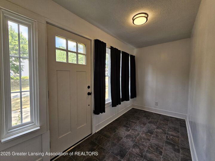 Property Photo:  121 W Ann Street  MI 48809 