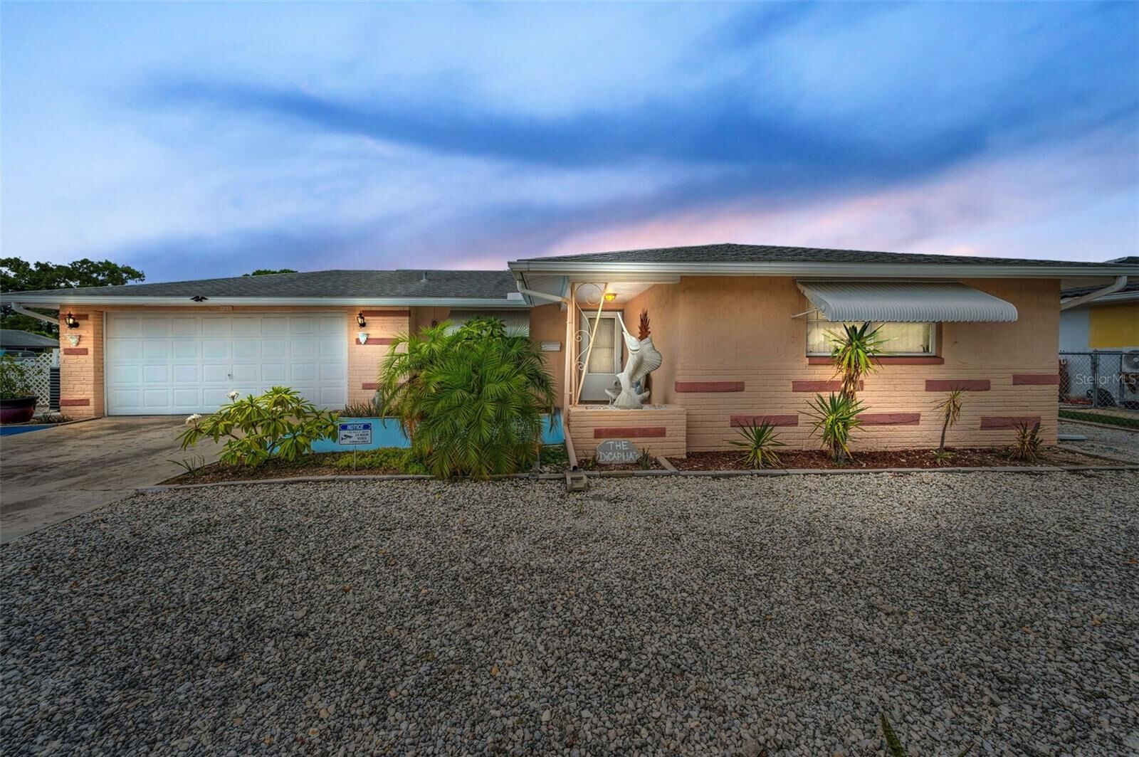 Property Photo:  7735 Canna Drive  FL 34668 