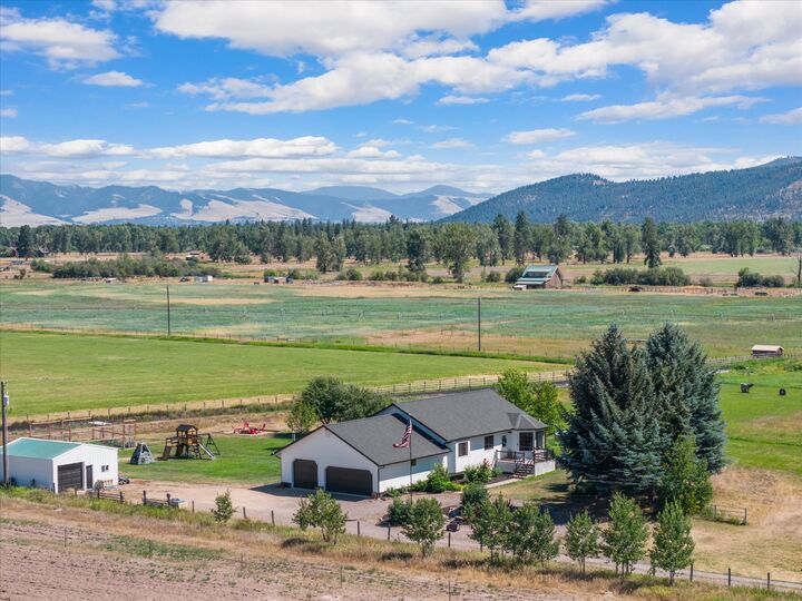 Property Photo:  13383 John Deere Road  MT 59808 