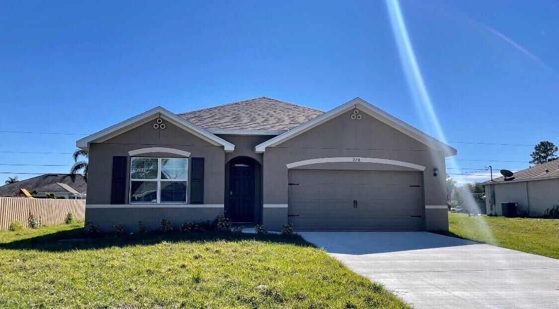 Property Photo: 978 SW Longfellow Road FL 34953