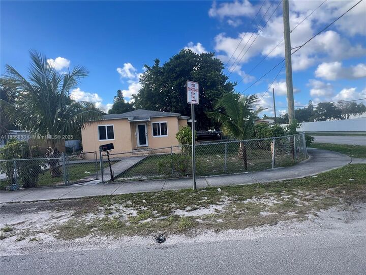 Property Photo:  801 NW 105th St  FL 33150 