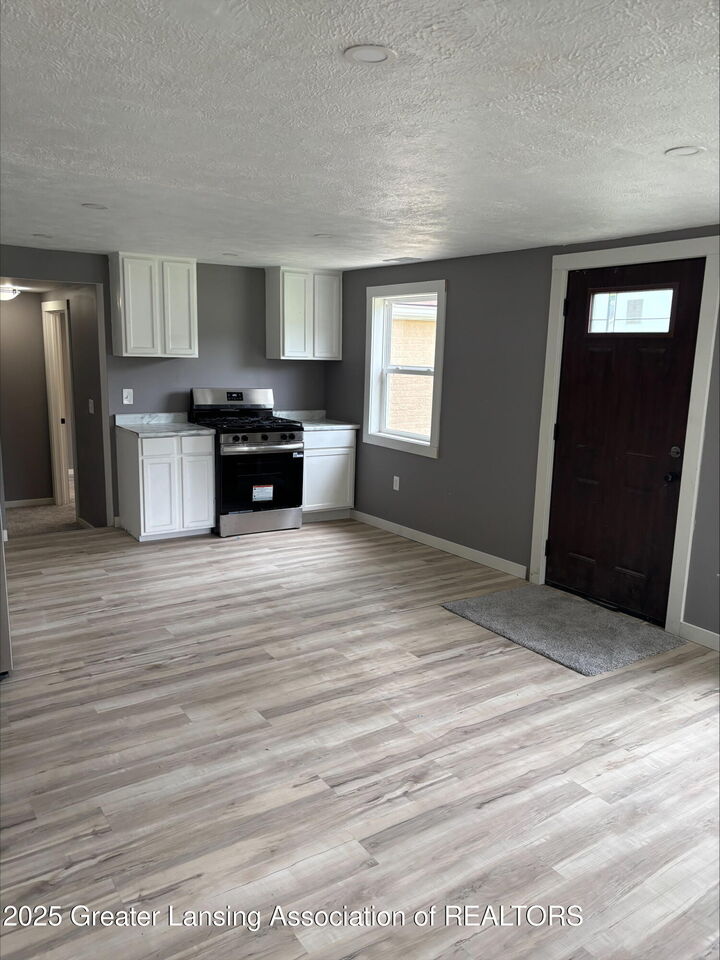 Property Photo:  720 Sawyer Road  MI 48911 