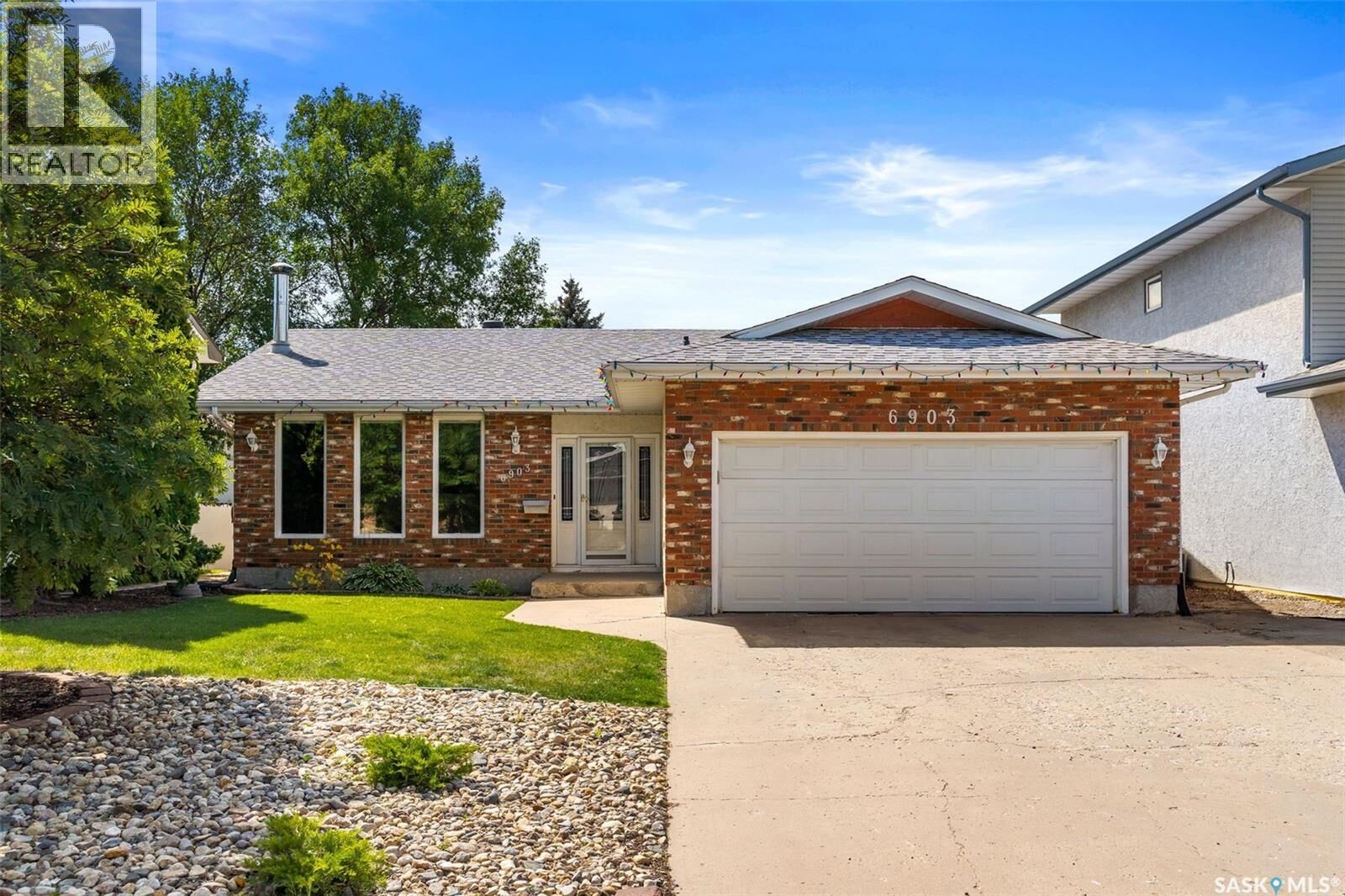 Photo de la propriété: 6903 Sherwood Drive SK S4X 1C2
