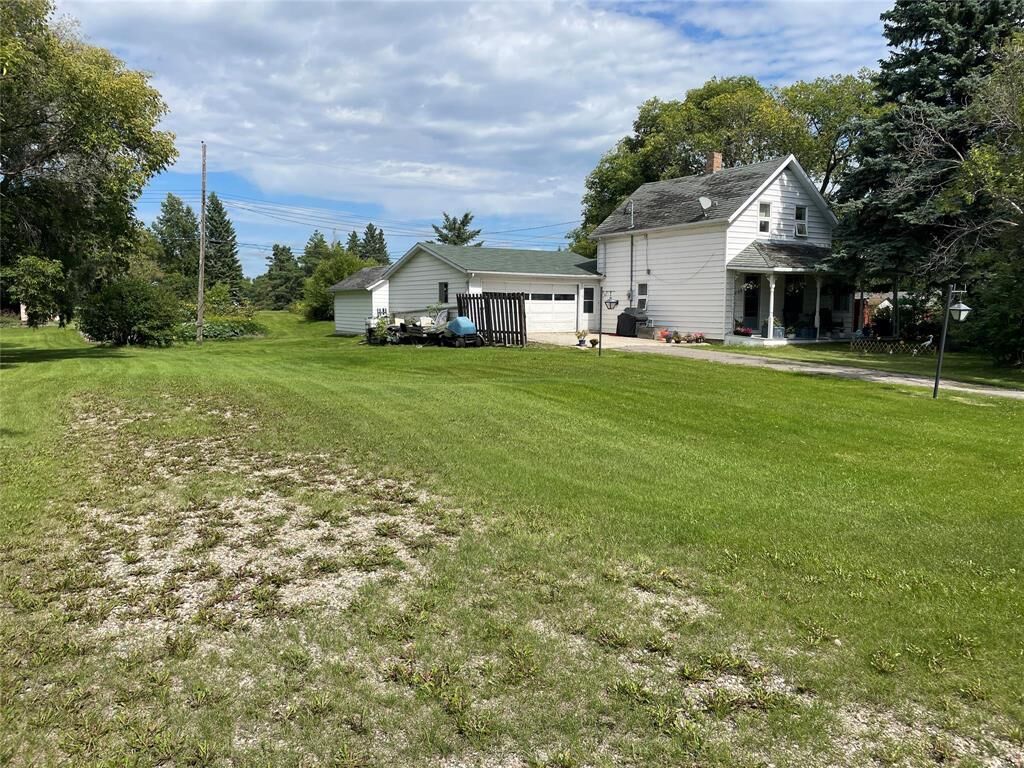 Property Photo:  100 Main Street  MB R0J 2C0 