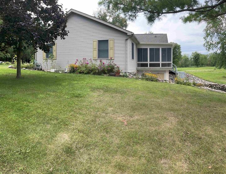 Property Photo: 1225 8 Mile Road MI 48631