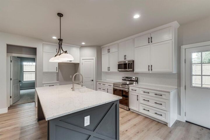 Photo de la propriété: 1104 E Jefferson Street TX 75165