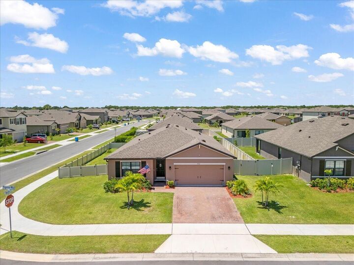 Property Photo: 7202 Tigereye Way FL 32949