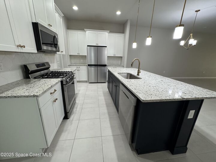 Property Photo:  8117 Tethys Court  FL 32940 
