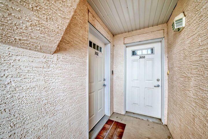 Property Photo:  50 Westland Road 302  AB T1S 2G4 