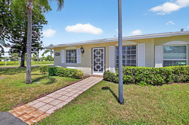 Property Photo:  13761 Flora Place A  FL 33484 